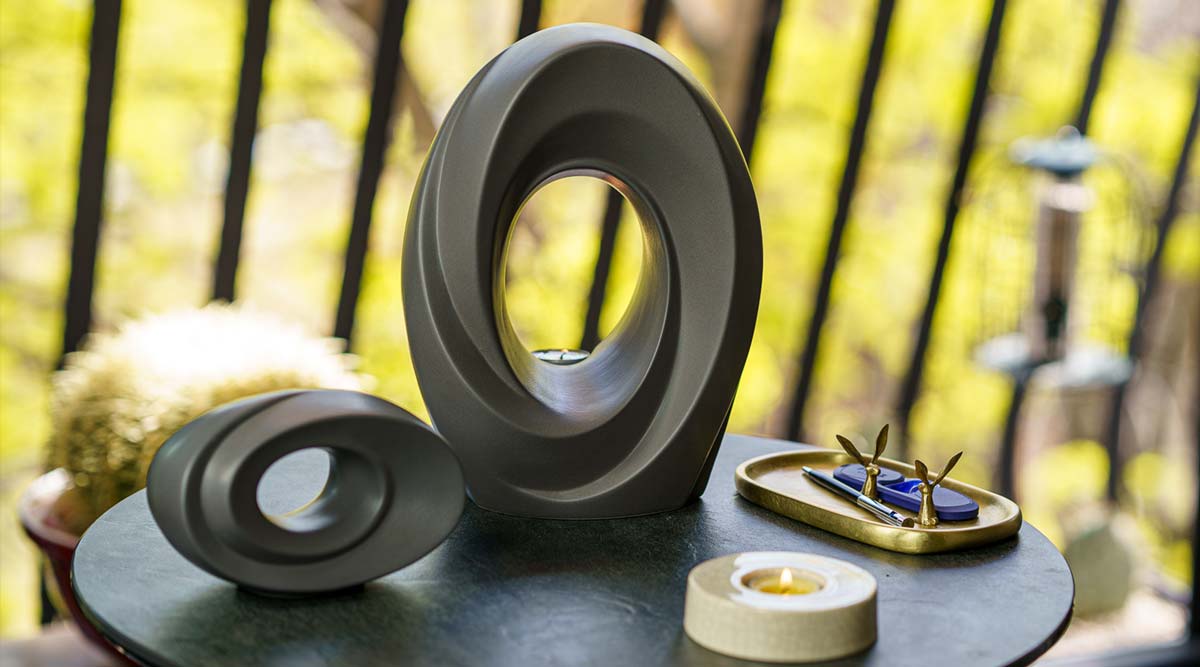 5 black cremation urns
