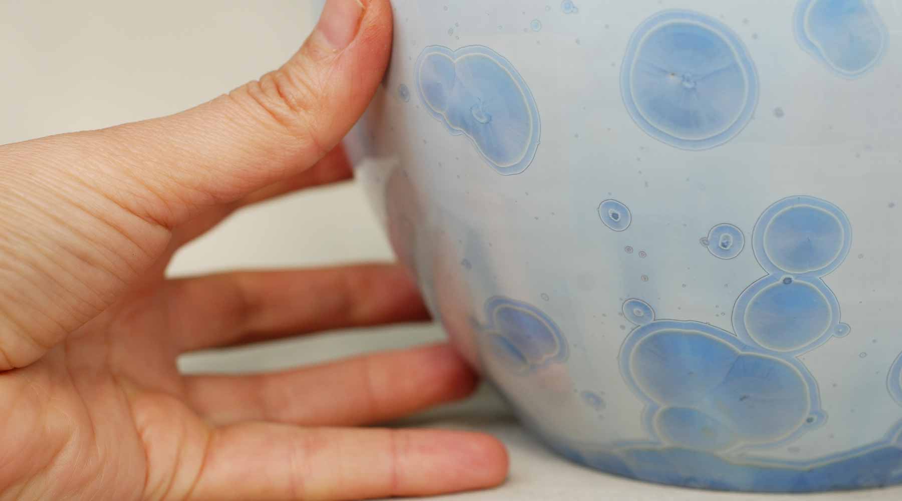 5 Cremation Urns with Cool Tones