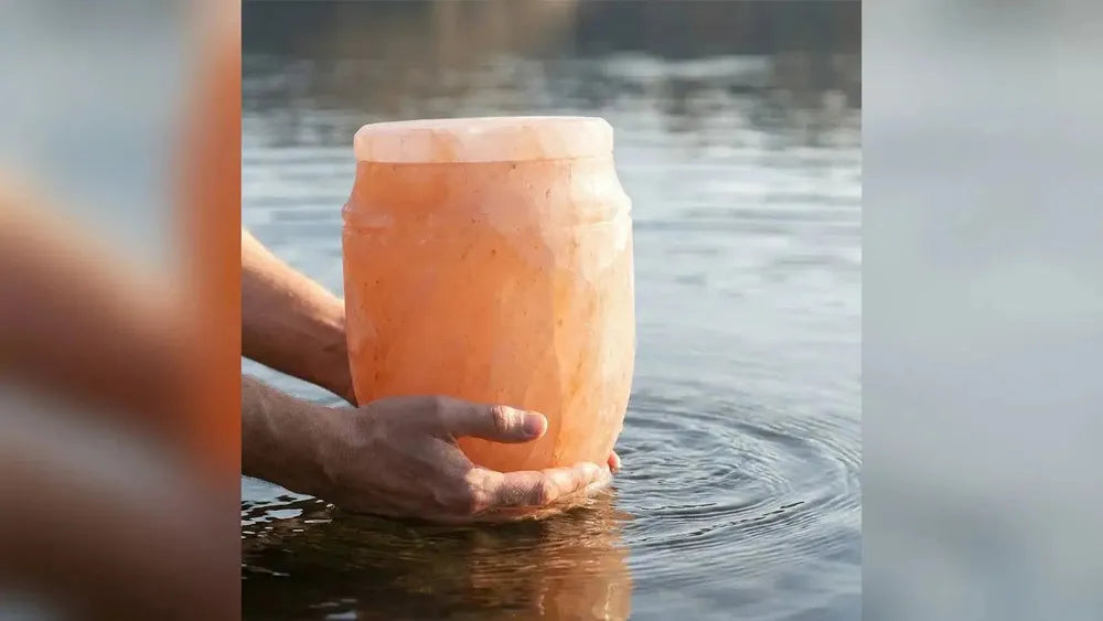 Himalayan rock salt biodegradable water urn held over water