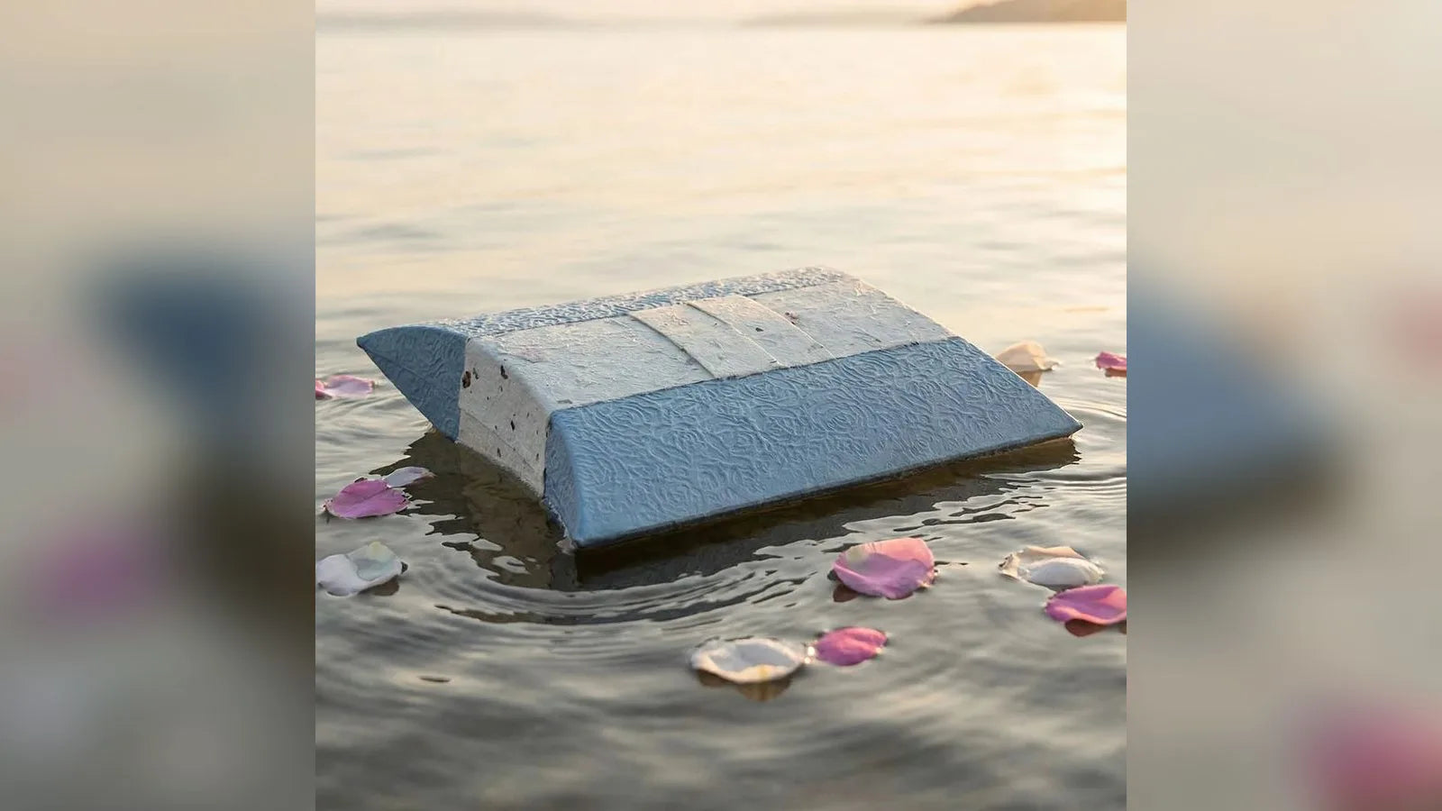 Journey biodegradable water urn floating on water