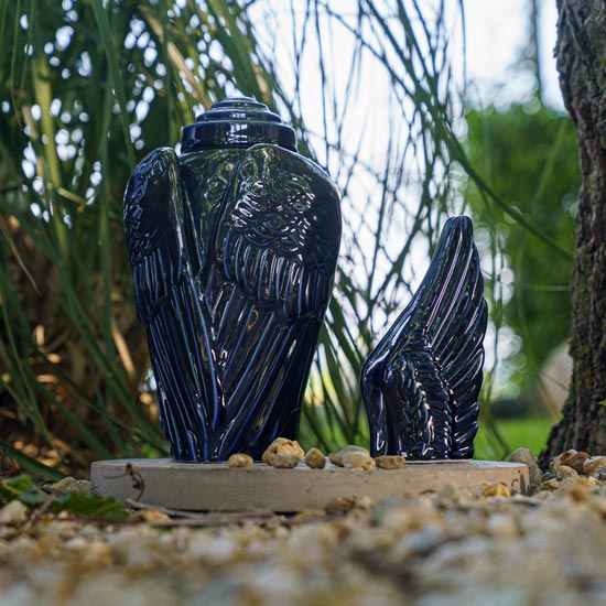 Angel Wings Ashes Keepsake Urn Metallic Blue in Garden