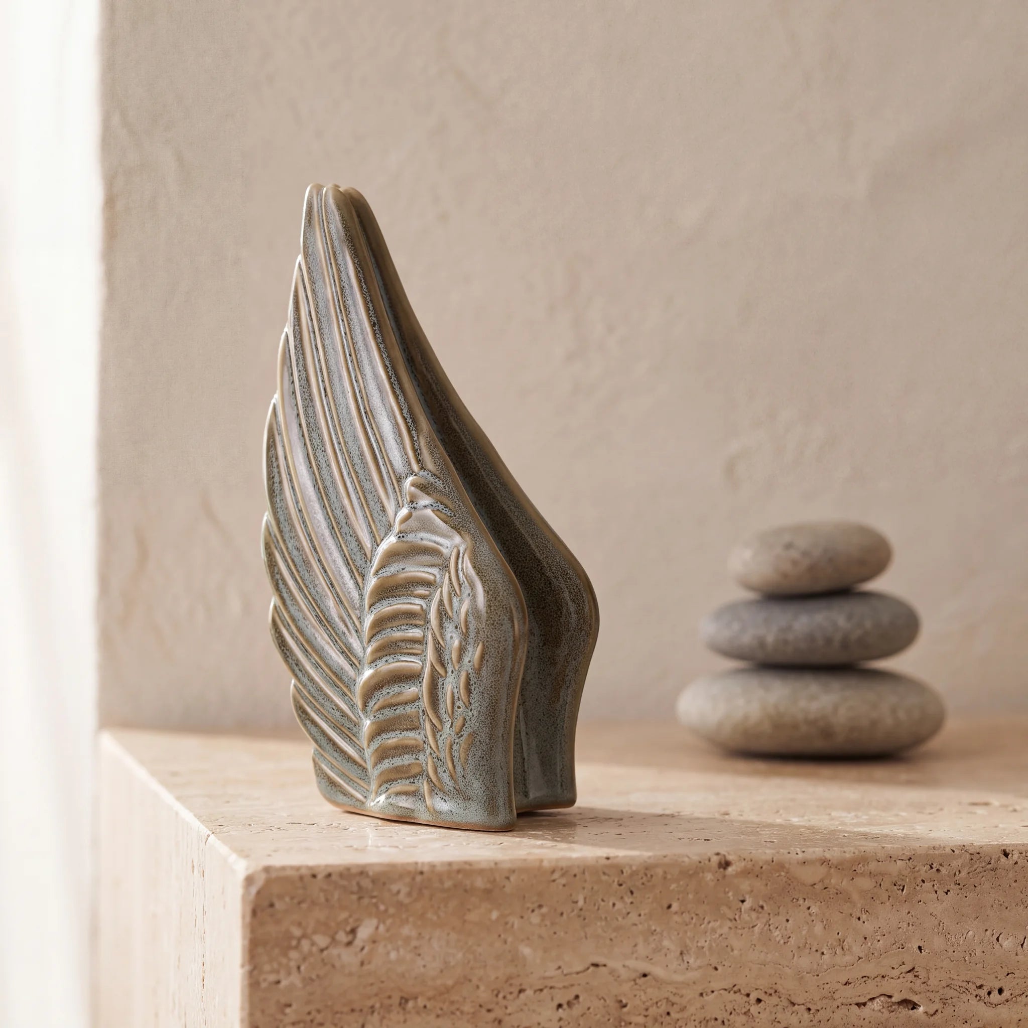 Angel-Wings-Small-Urn-for-Ashes-in-Oily-Green-keepsake_pebbles