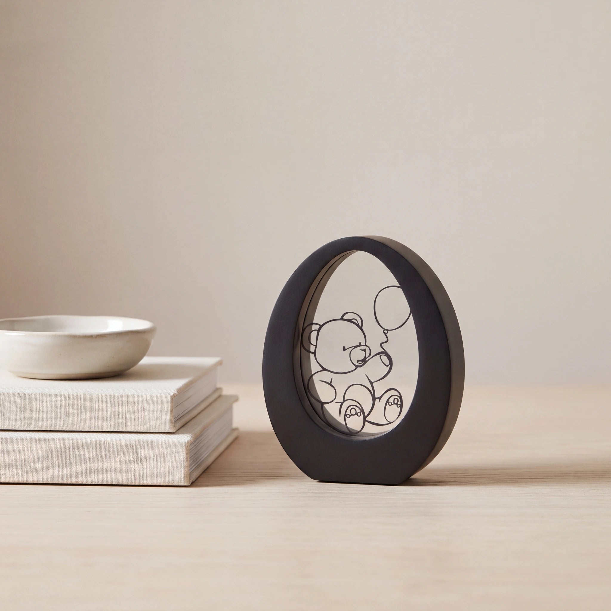 Bear-Small-Urn-for-Ashes-in-Matte-Black-Stainless-Steel-keepsake_books_dish