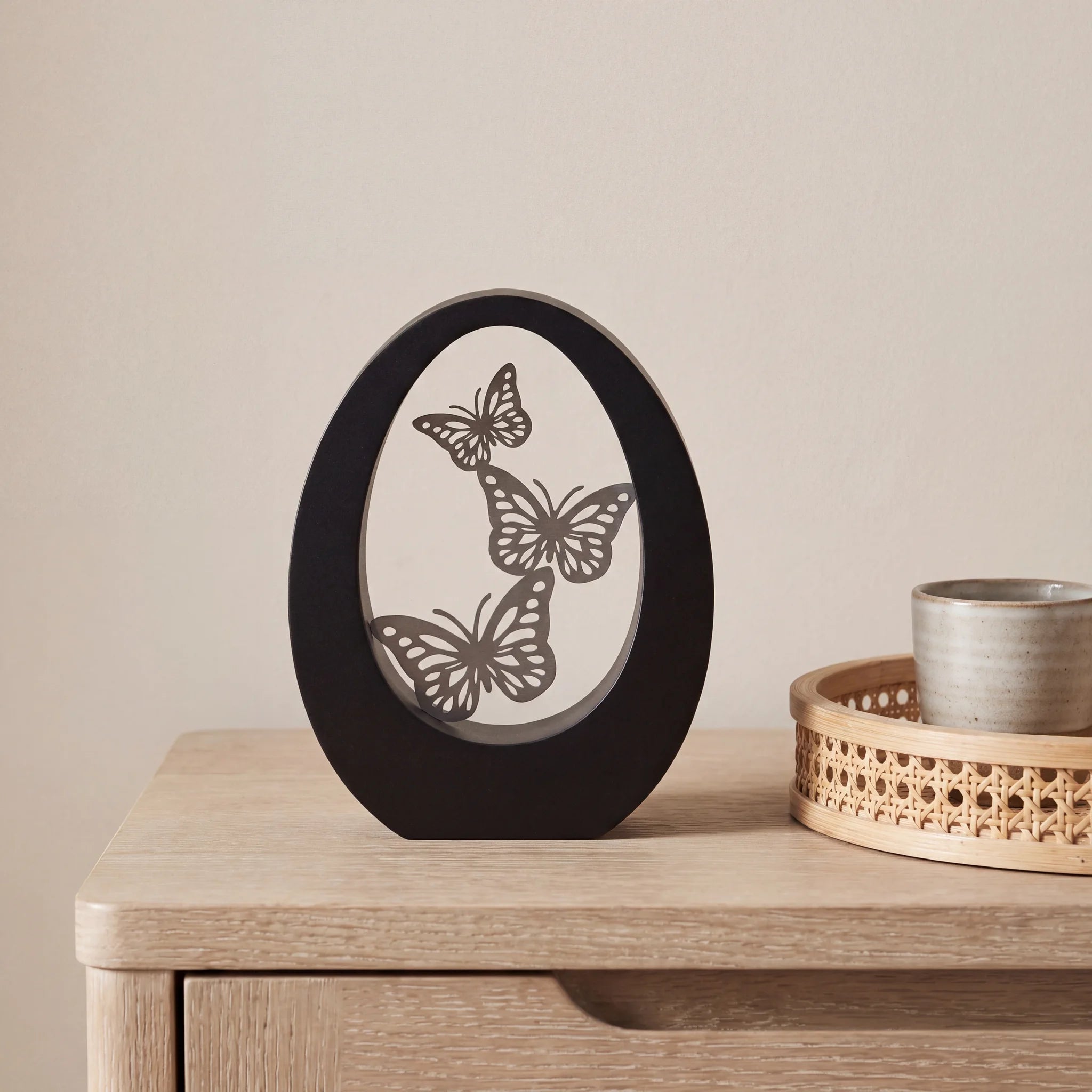Butterfly-Small-Urn-for-Ashes-in-Matte-Black-Stainless-Steel-Cane-Tray