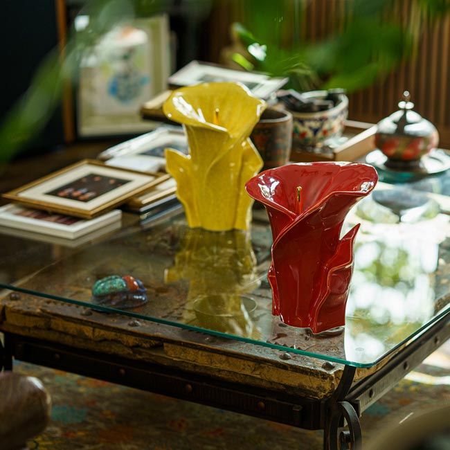 Calla Lilly Medium Cremation Urn for Ashes Yellow Crackle Glaze Red on Coffee Table