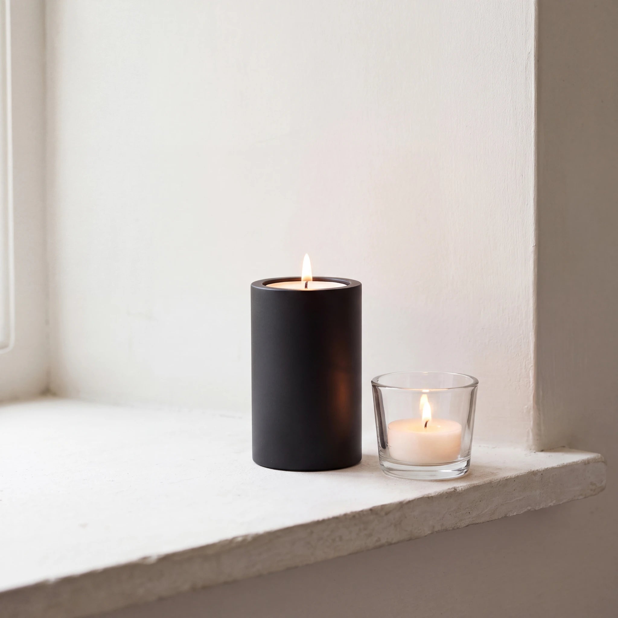 Candle-Extra-Small-Urn-for-Ashes-in-Matte-Black-Stainless-Steel-keepsake_tealight_ledge