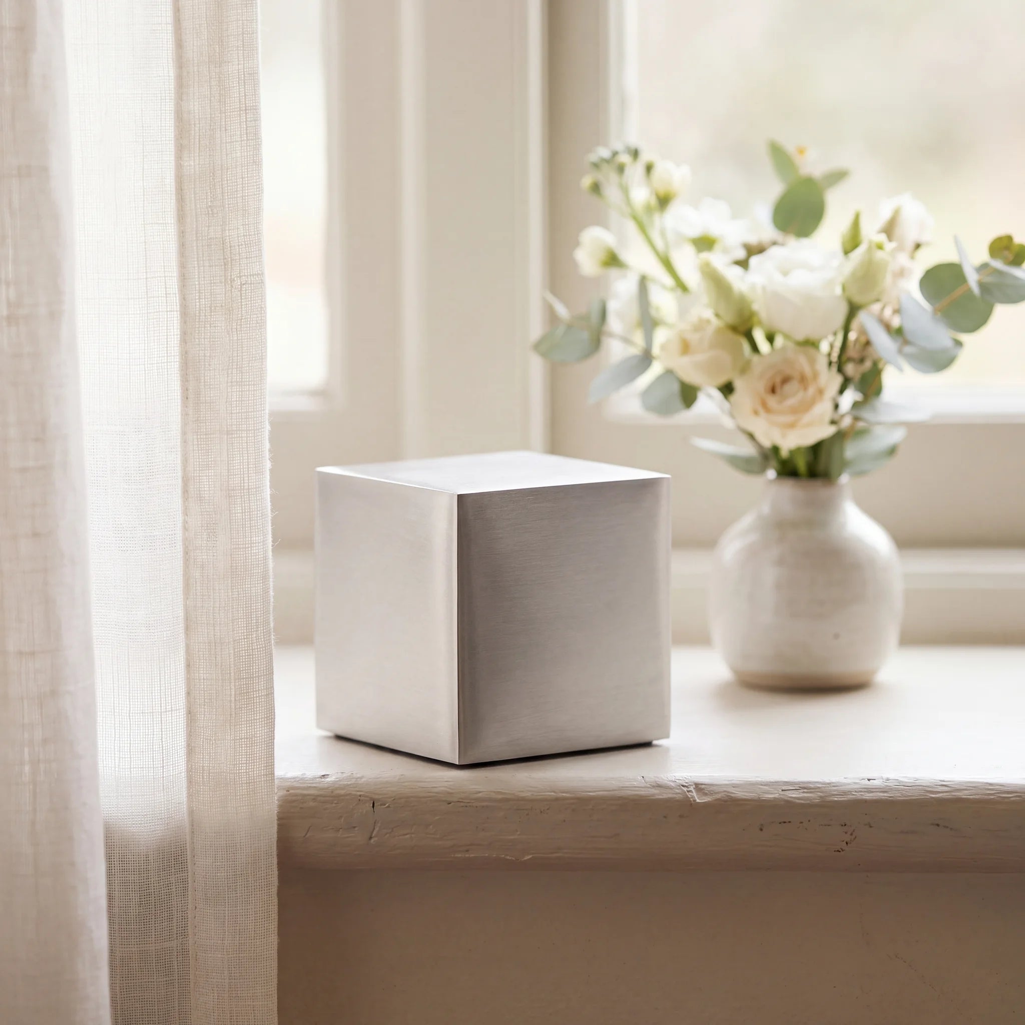 Cube-Small-Urn-for-Ashes-in-Stainless-Steel-keepsake_windowsill_posy