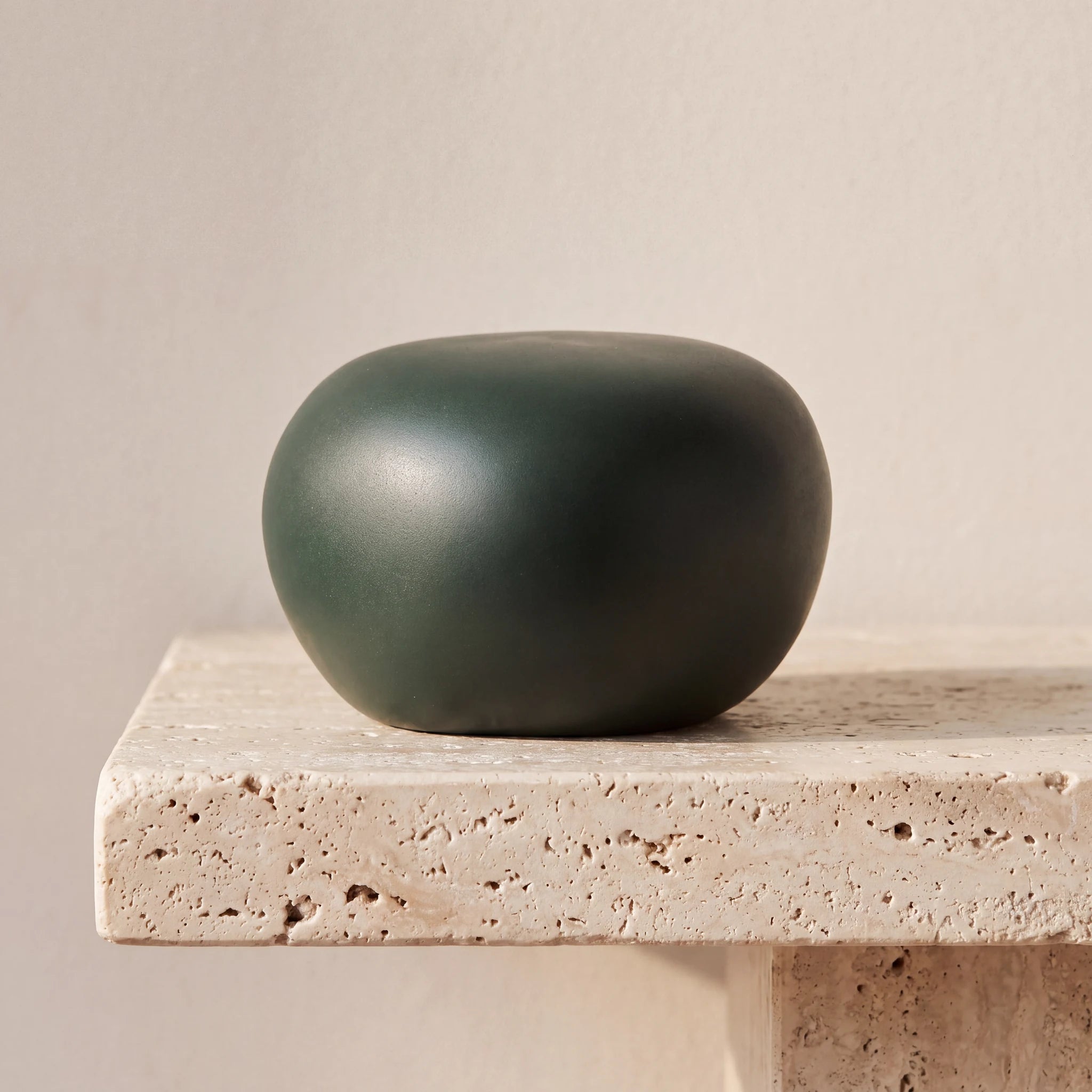 Cuddle-Stone-Keepsake-Urn-for-Ashes-in-Forest-Green-Travertine-Ledge