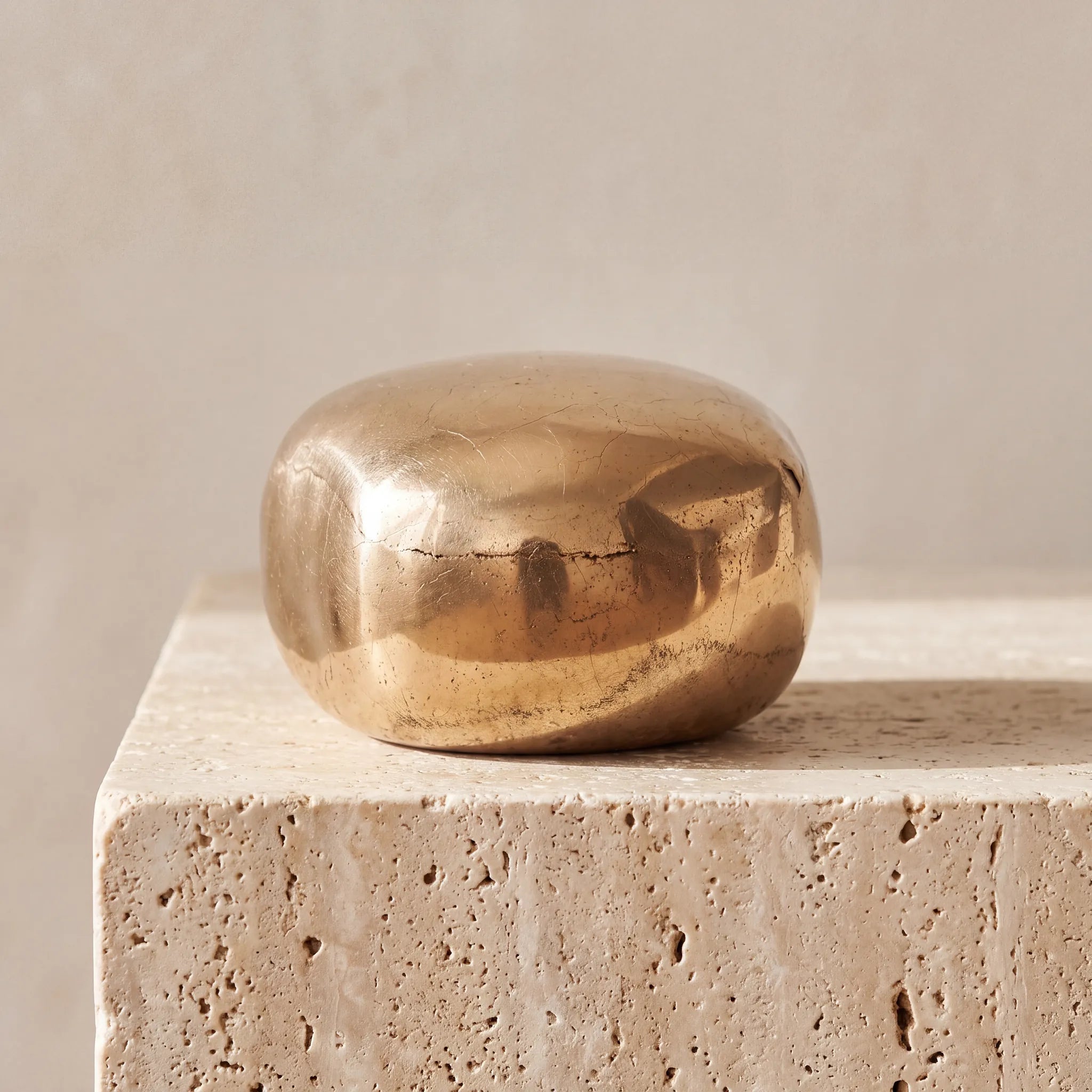 Cuddle-Stone-Keepsake-Urn-for-Ashes-in-Gold-Travertine-Ledge
