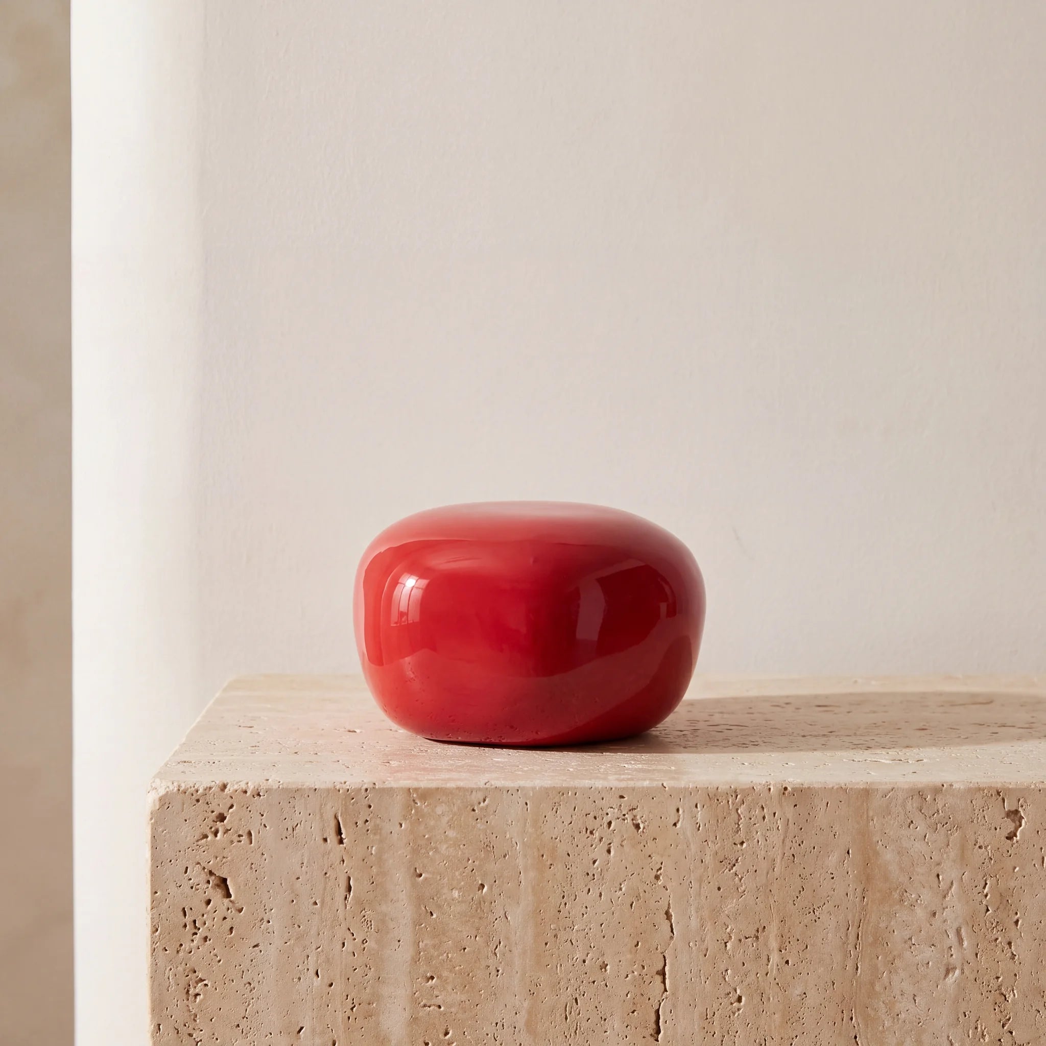 Cuddle-Stone-Keepsake-Urn-for-Ashes-in-Red-Travertine-Ledge