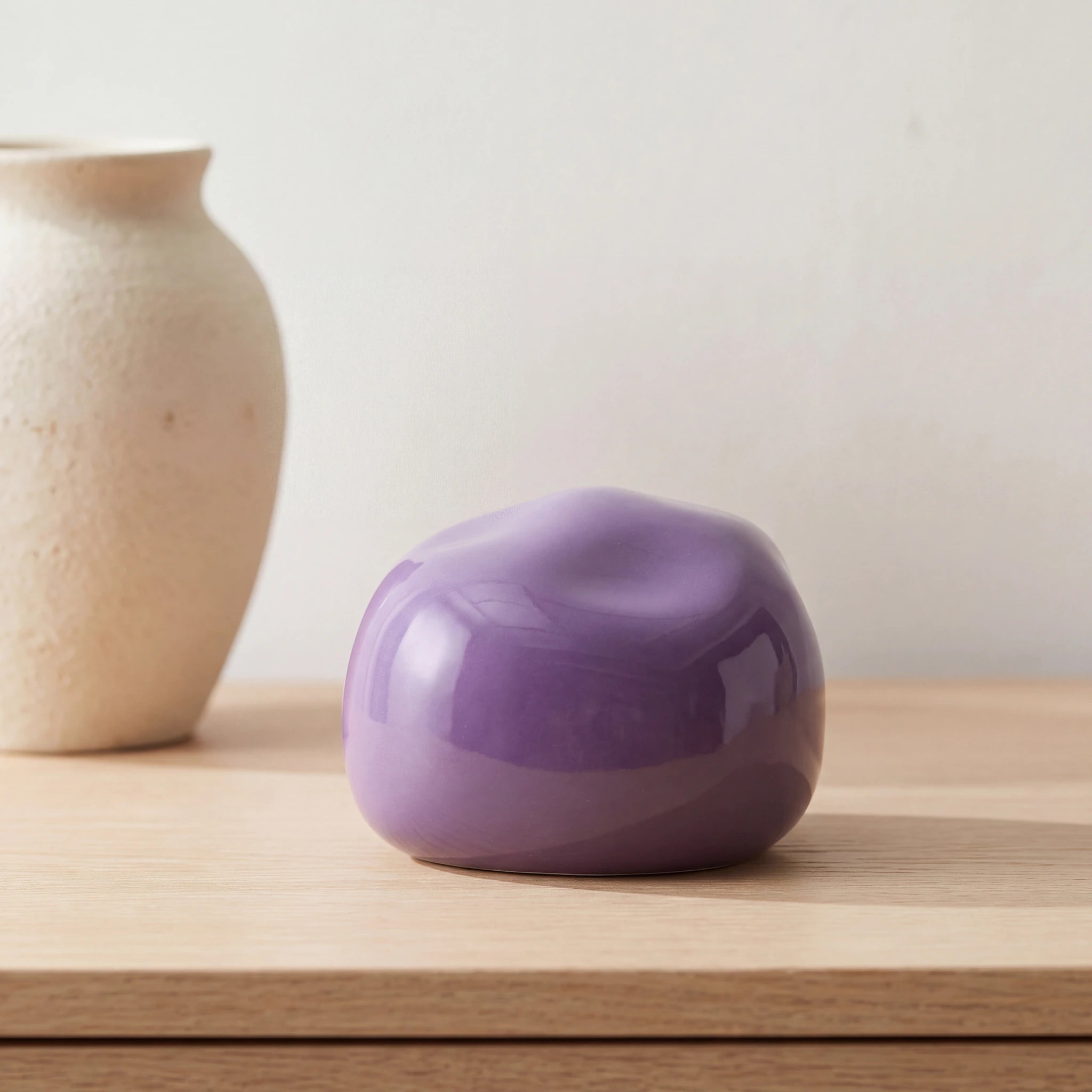 Cuddle-Stone-Keepsake-Urn-for-Ashes-in-Violet-Oak-Console