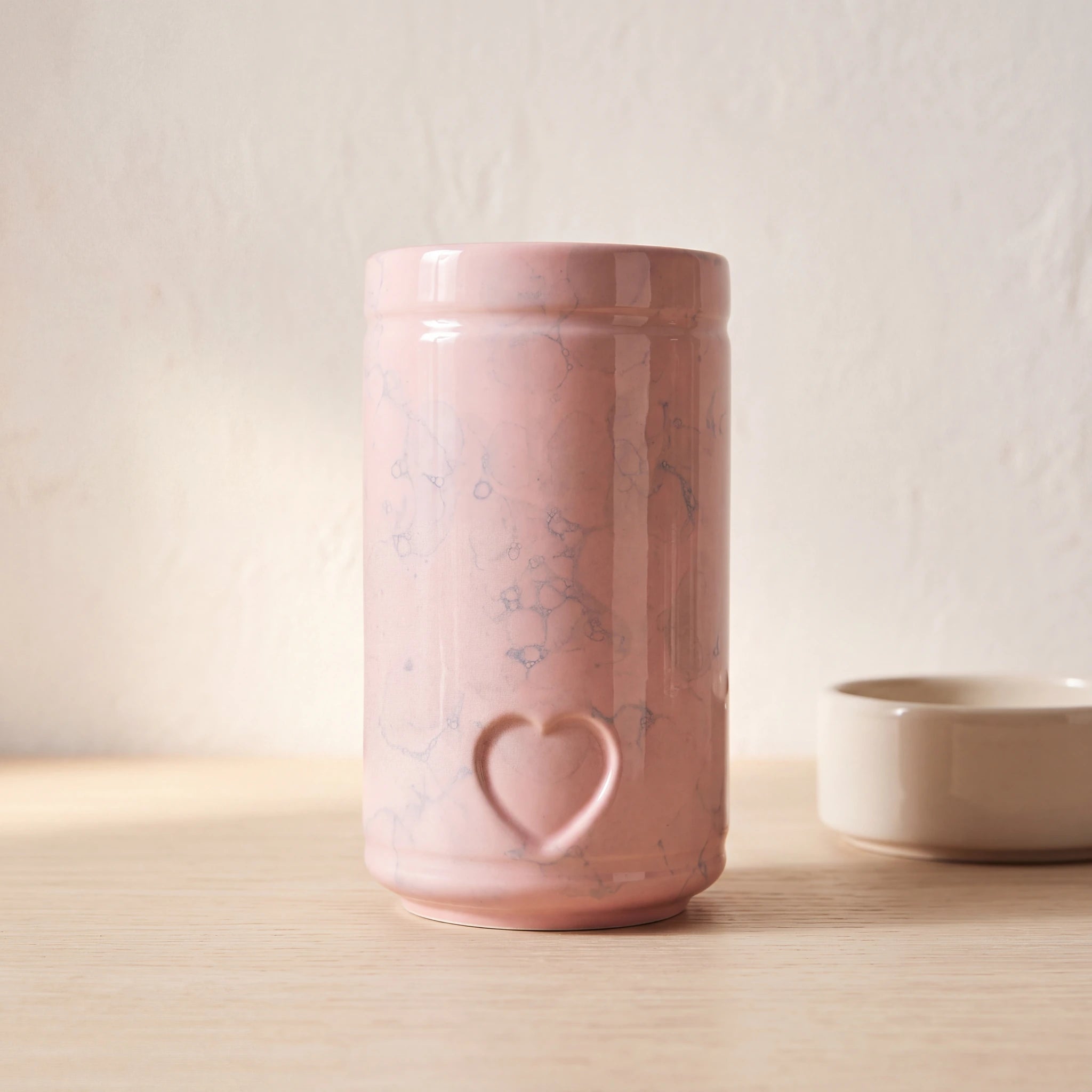 Cylinder-Pet-Urn-for-Ashes-in-Pink-Sky-pet_bowl_ledge