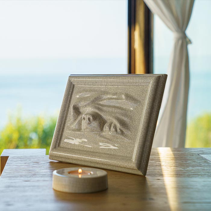 Dog Cremation Urn For Pets Ashes In Crackle Glaze On Table By Window