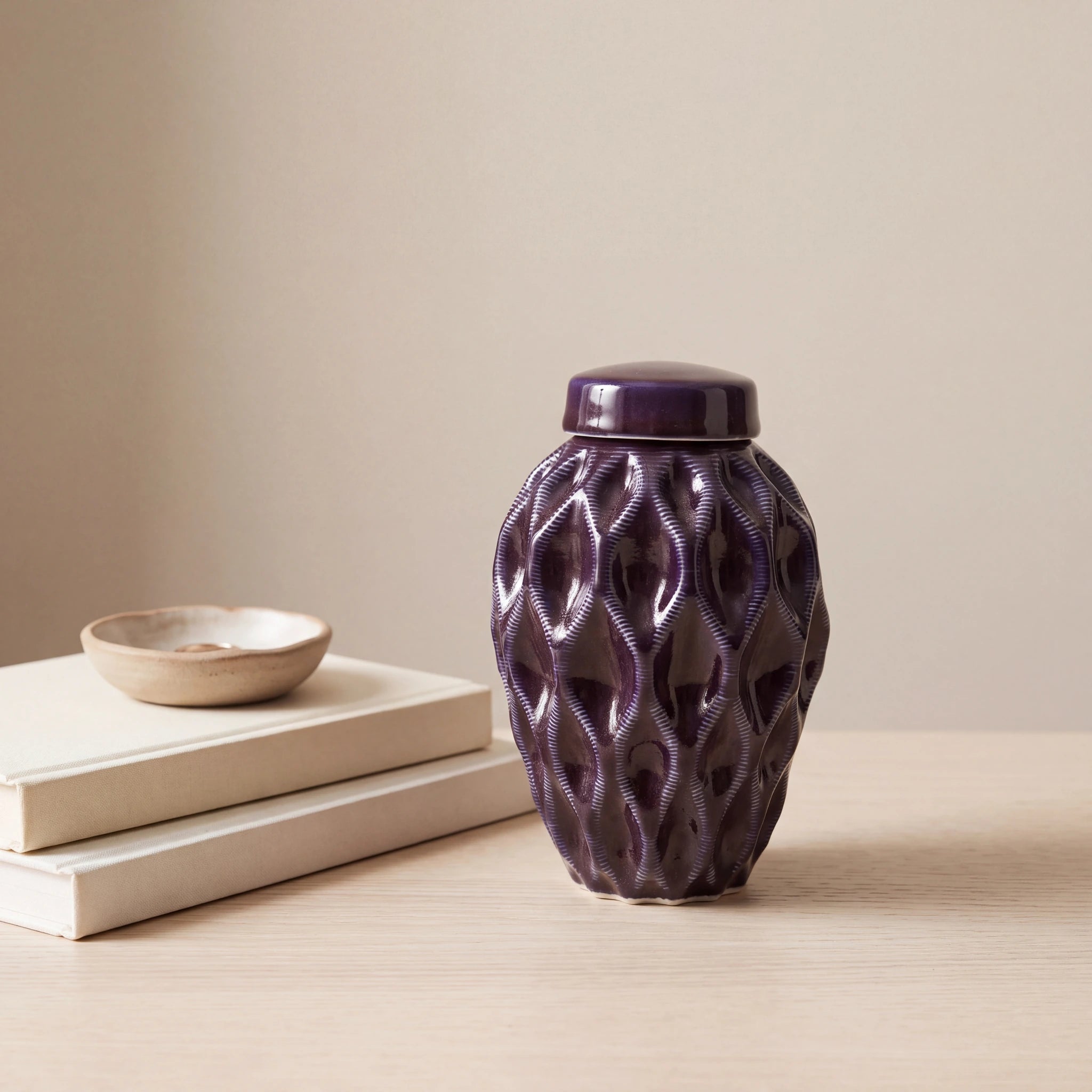 Echo-Keepsake-Urn-for-Ashes-in-Purple-keepsake_books_dish-Left-Angle