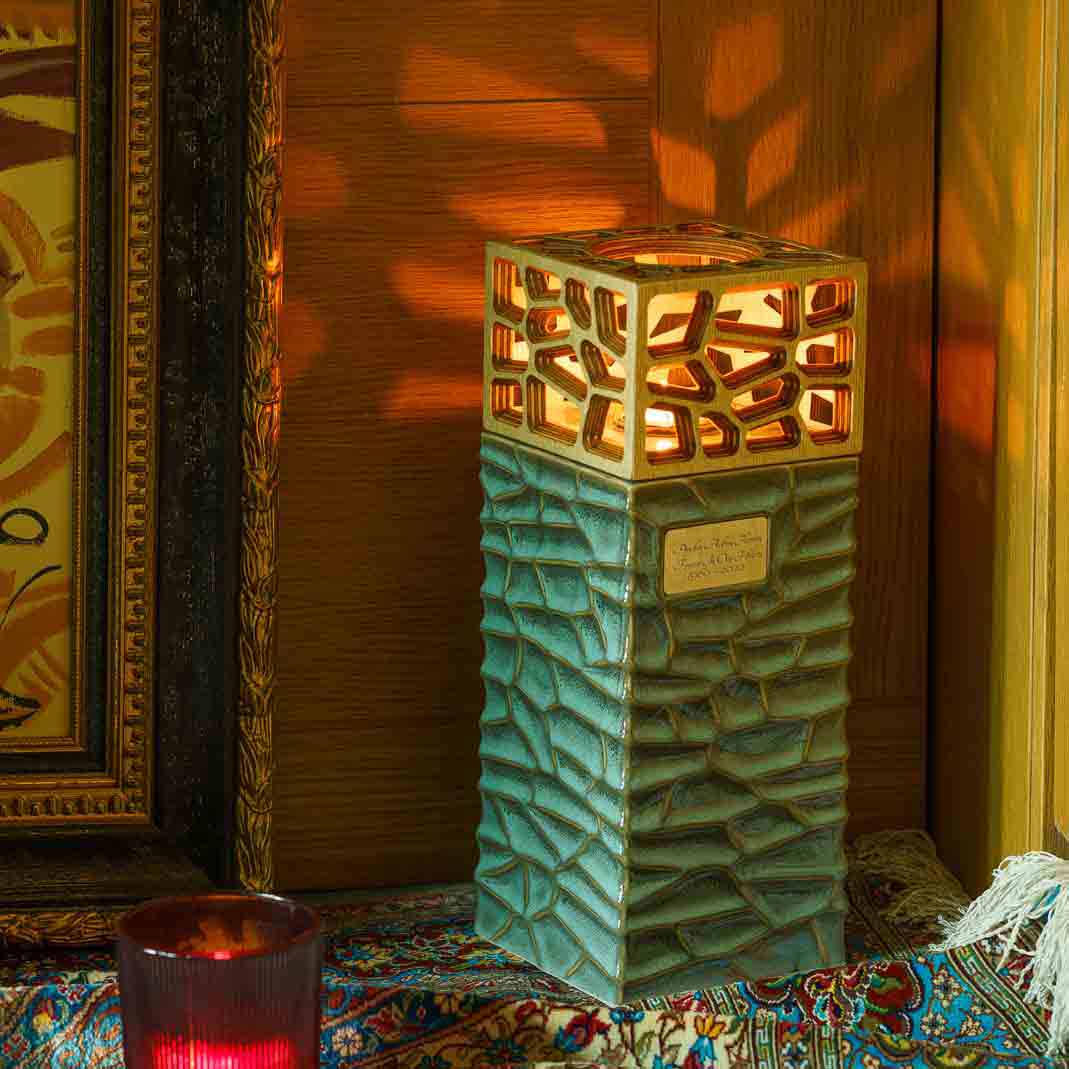 Eternal Lantern Candle Adult Cremation Urn for Ashes Oily Green Front Right In Home