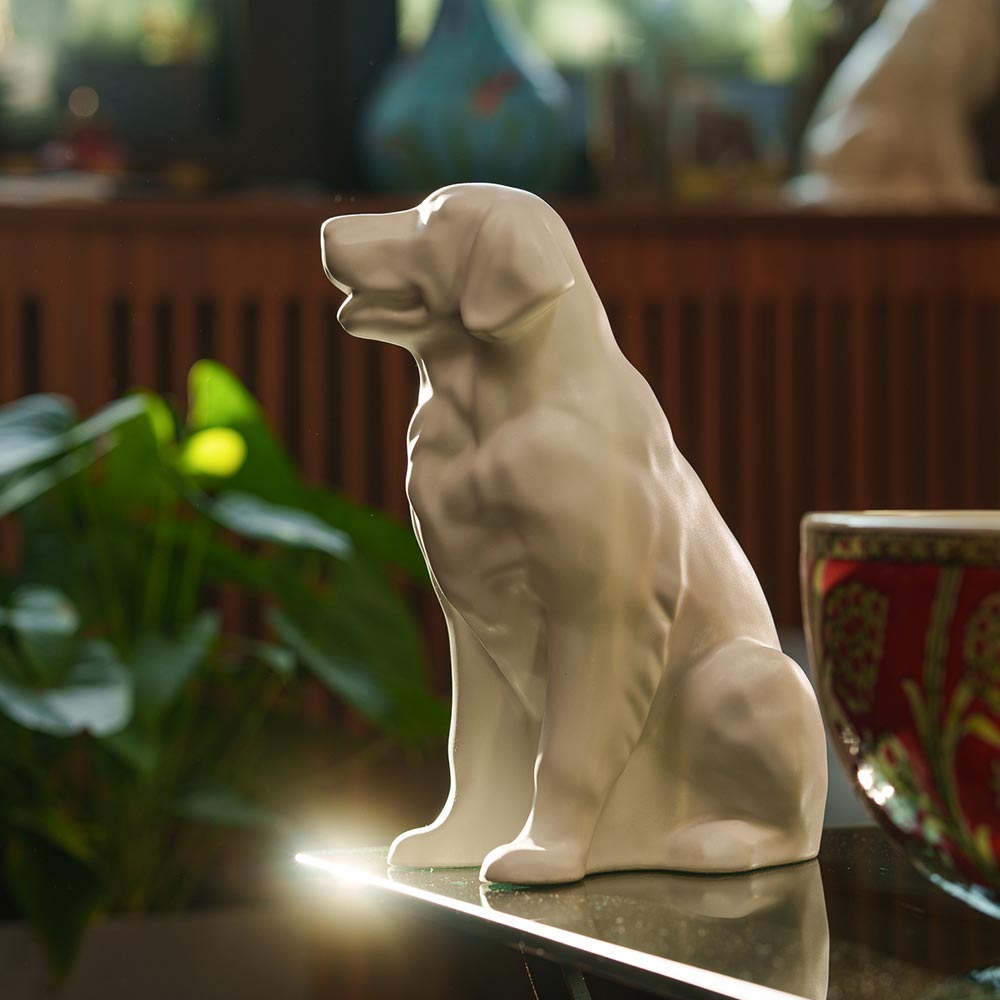 Golden Retriever Pet Urn for Ashes in Matte White on Table