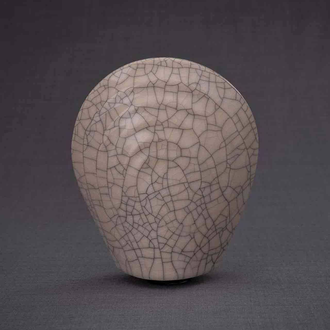 Guardian Angel Ashes Keepsake Urn in Crackle Glaze Dark Background Behind
