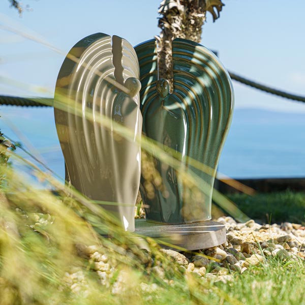 Guardian Cremation Urn for Ashes Cream and Oily Green Outside in the Sun
