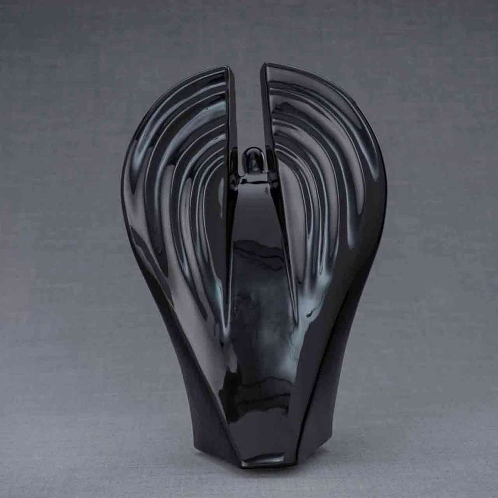 Guardian Cremation Urn for Ashes in Black Behind Grey Background