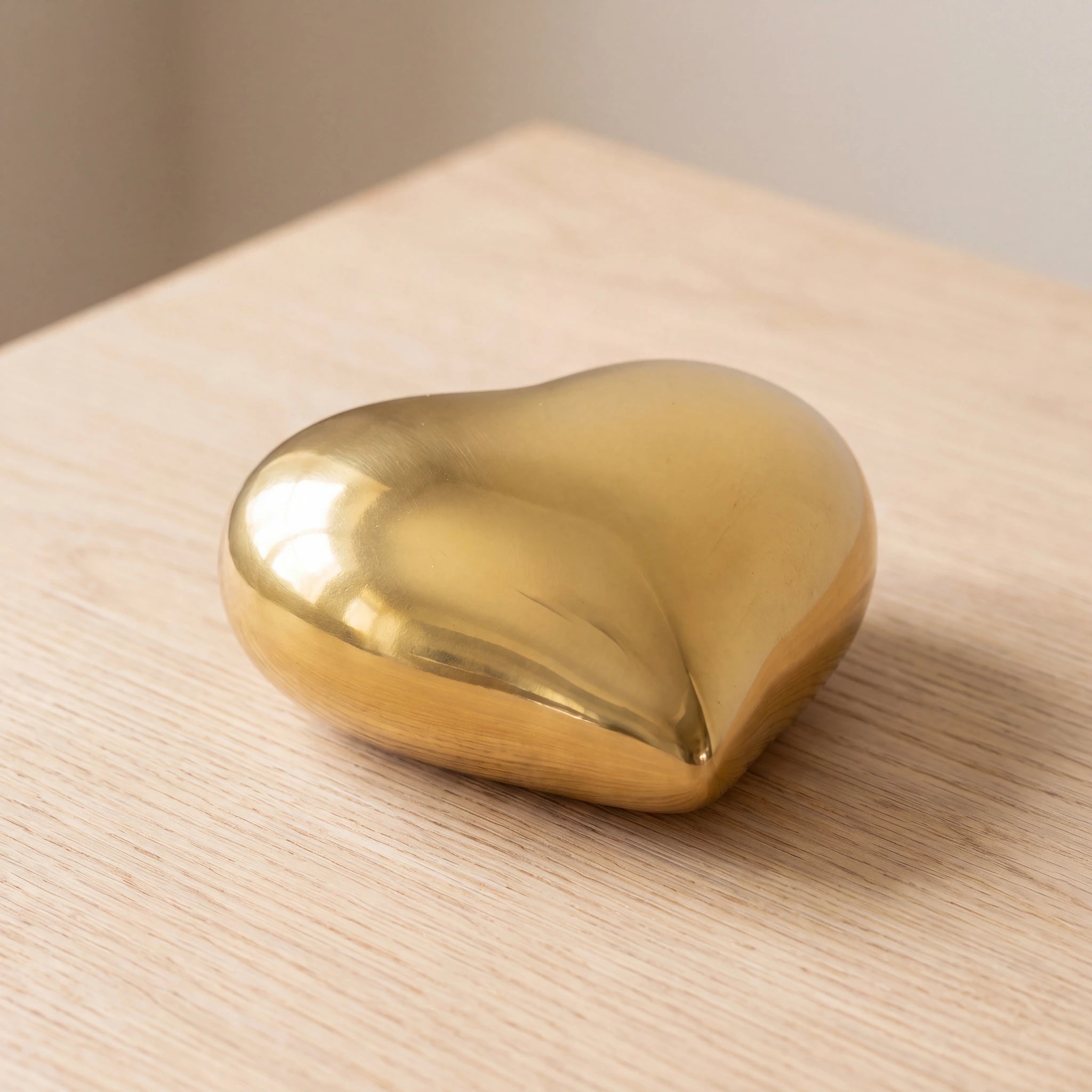 Heart-Keepsake-Urn-for-Ashes-in-Gold-On-Oak