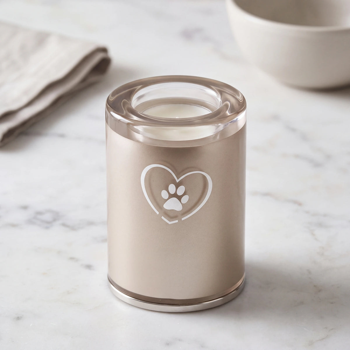 Heart-Pawprint-Crystal-Pet-Candle-Urn-for-Ashes-in-Cappuccino-Small-On-Marble