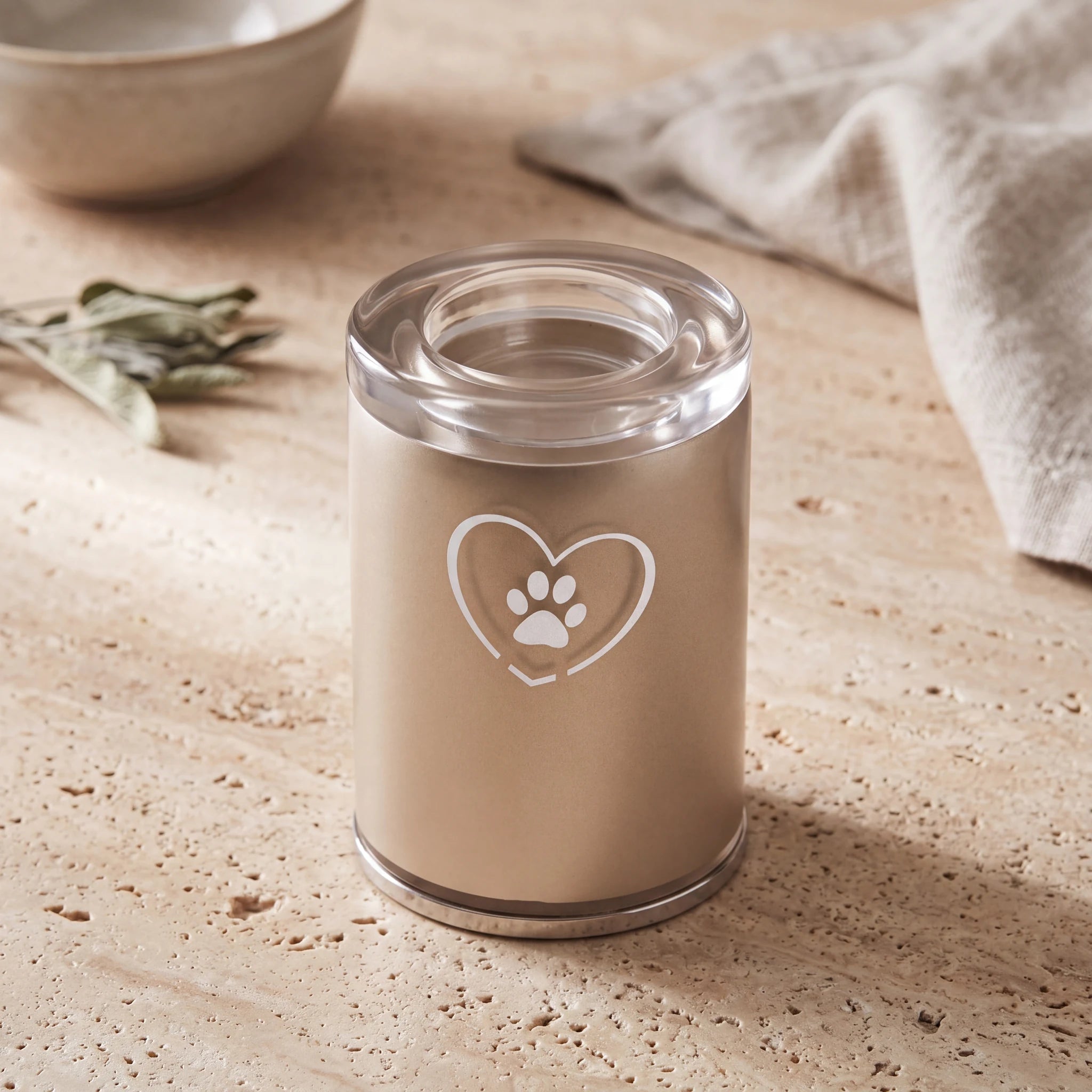 Heart-Pawprint-Crystal-Pet-Candle-Urn-for-Ashes-in-Cappuccino-Small-On-Travertine