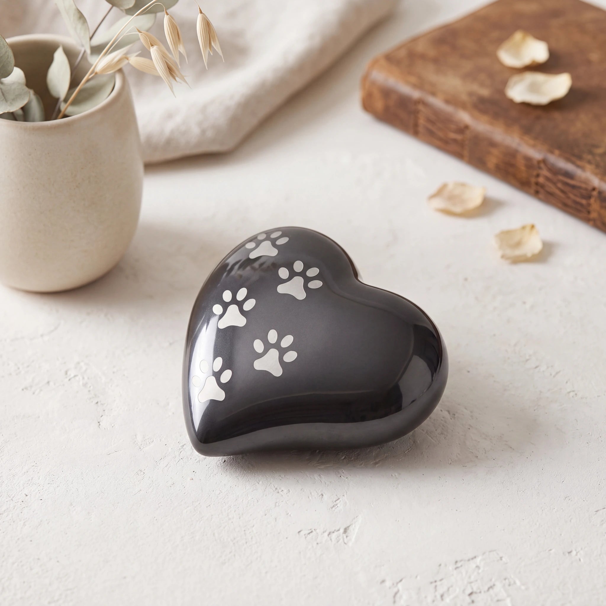 Heart-Pawprints-Pet-Urn-for-Ashes-in-Graphite-Silver-Medium-heart_plaster_above