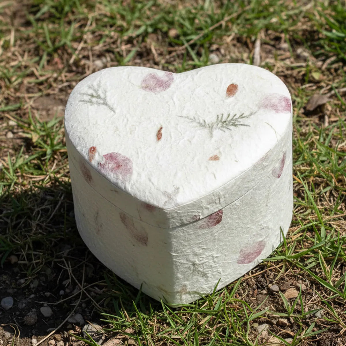 Heart Shaped Biodegradable Adult Cremation Urn for Ashes Outside in Sunlight