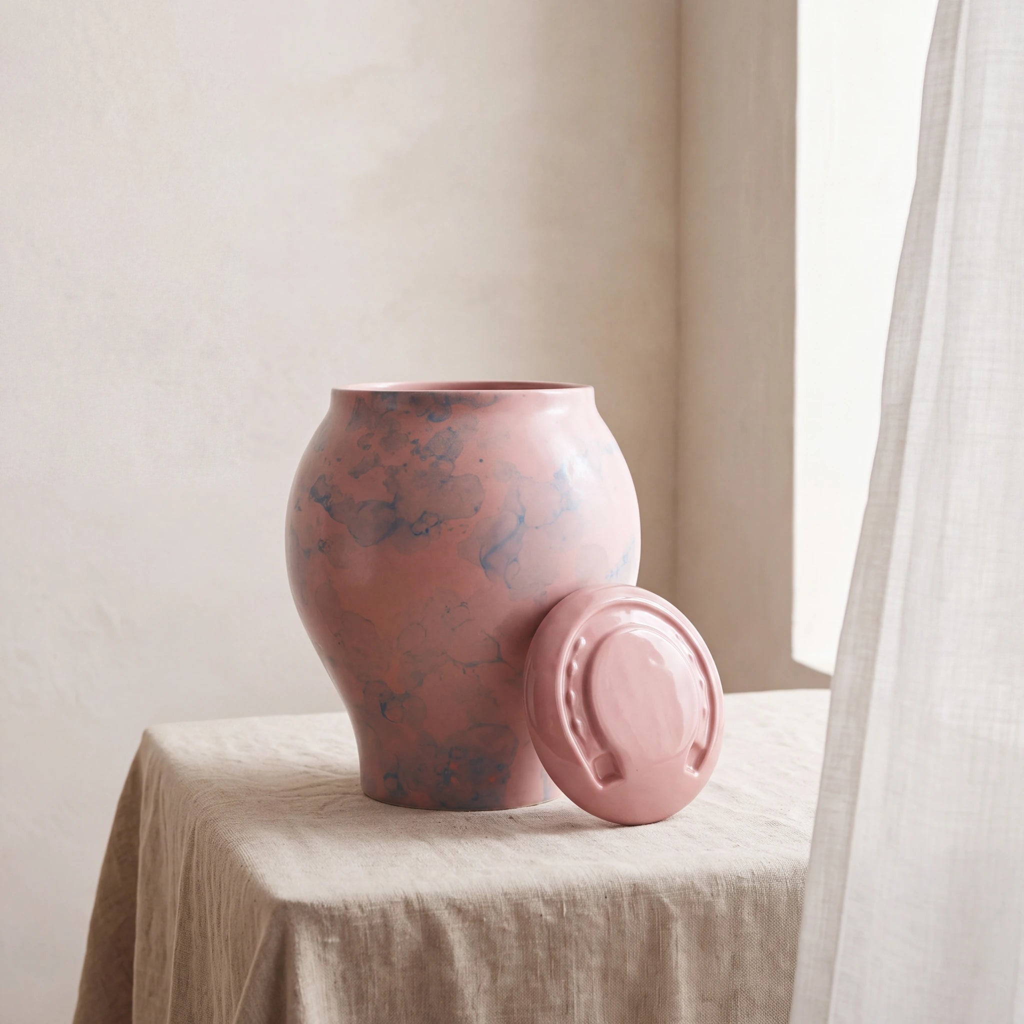 Horse-Cremation-Urn-for-Ashes-in-Pink-Sky-Linen-Table