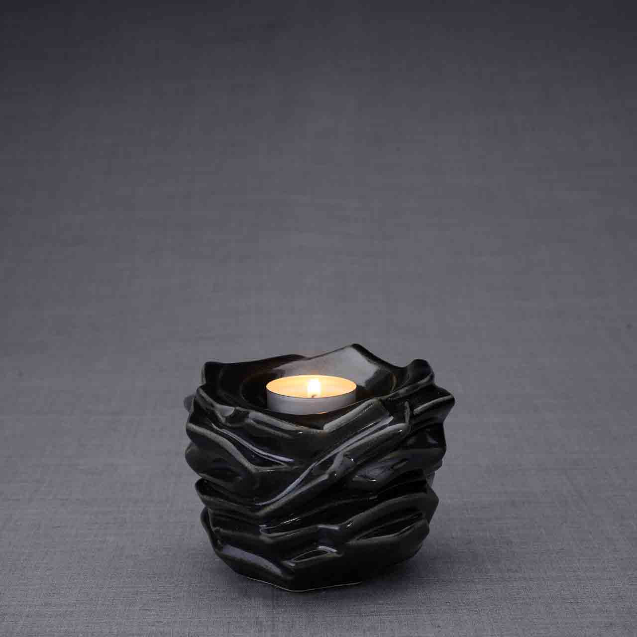 Illumination Candle Keepsake Urn in Glossy Black Dark Background