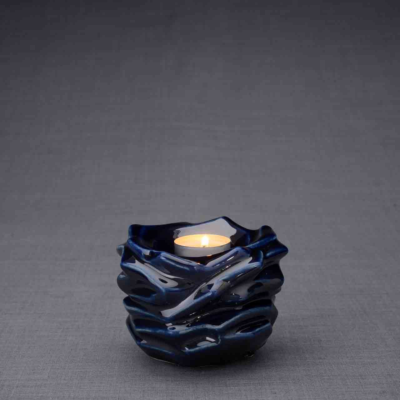 Illumination Candle Keepsake Urn in Metallic Blue Dark Background