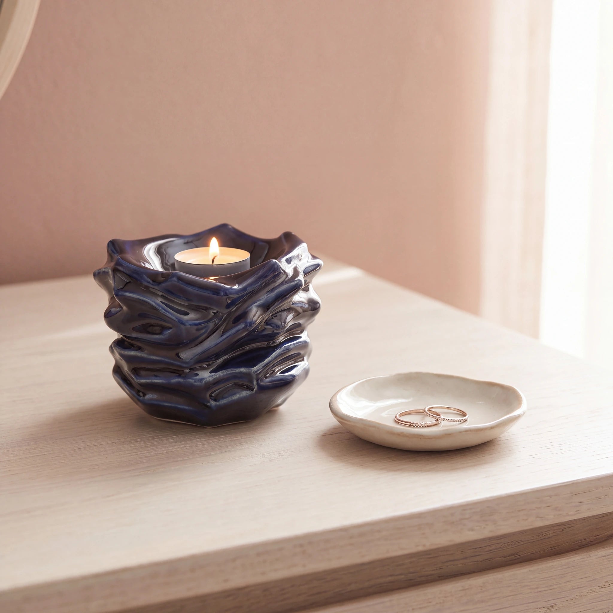 Illumination-Candle-Small-Urn-for-Ashes-in-Metallic-Blue-keepsake_ring_dish-Left-Angle