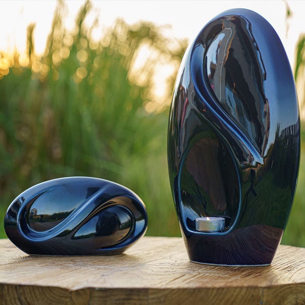 Infinity Cremation Urn for Ashes Metallic Blue Outside Sunset