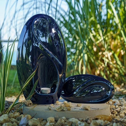 Infinity Cremation Urn for Ashes Metallic Blue in Garden