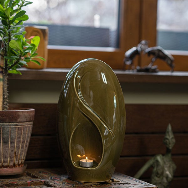Infinity Cremation Urn for Ashes Oily Green by Window