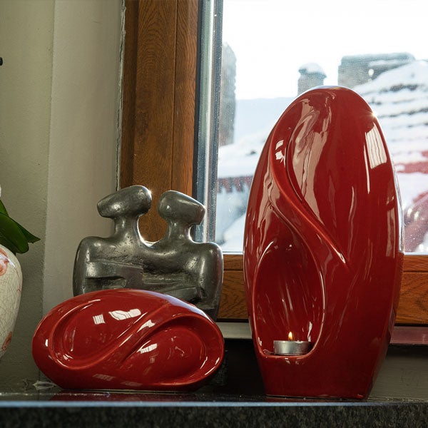 Infinity Cremation Urn for Ashes Range Red by Window