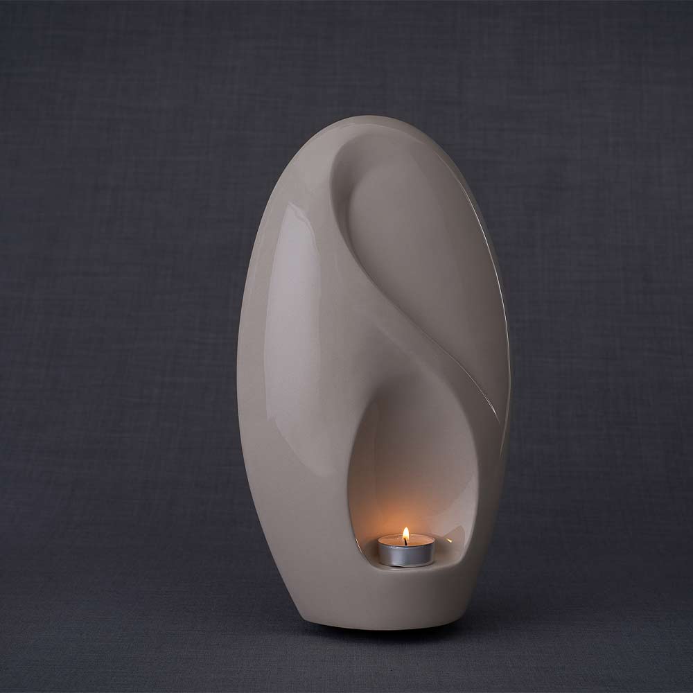 Infinity Cremation Urn for Ashes in Cream Left Frog