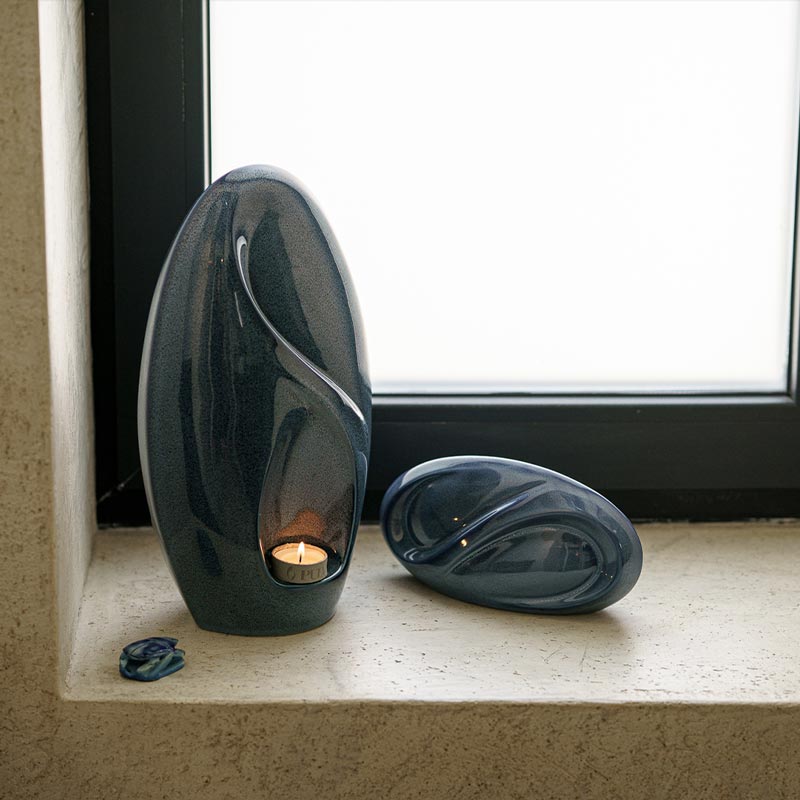 Infinity Small Urn for Ashes Blue with Adult Urn by Window