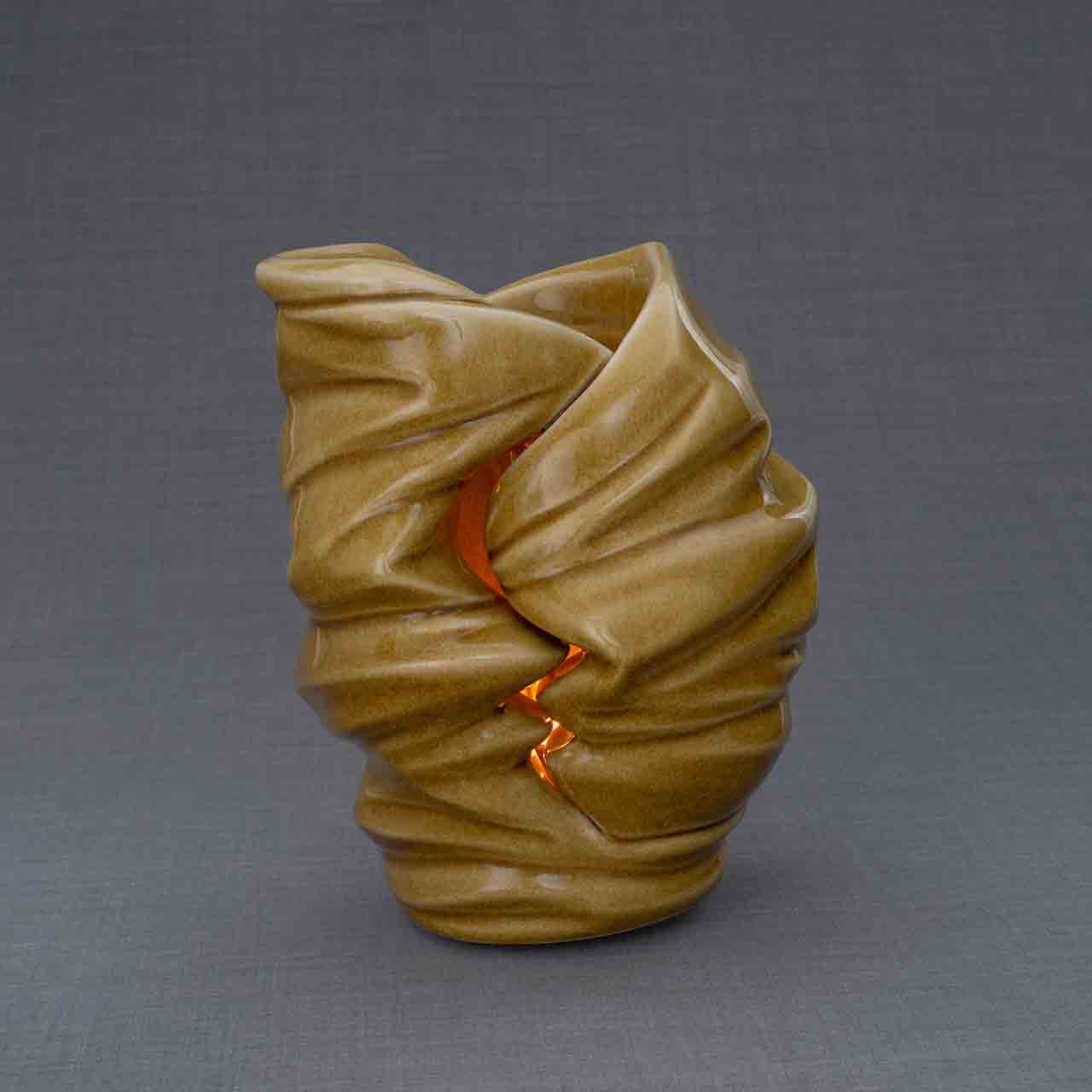 Light Cremation Urn for Ashes in Dark Sand Dark Background