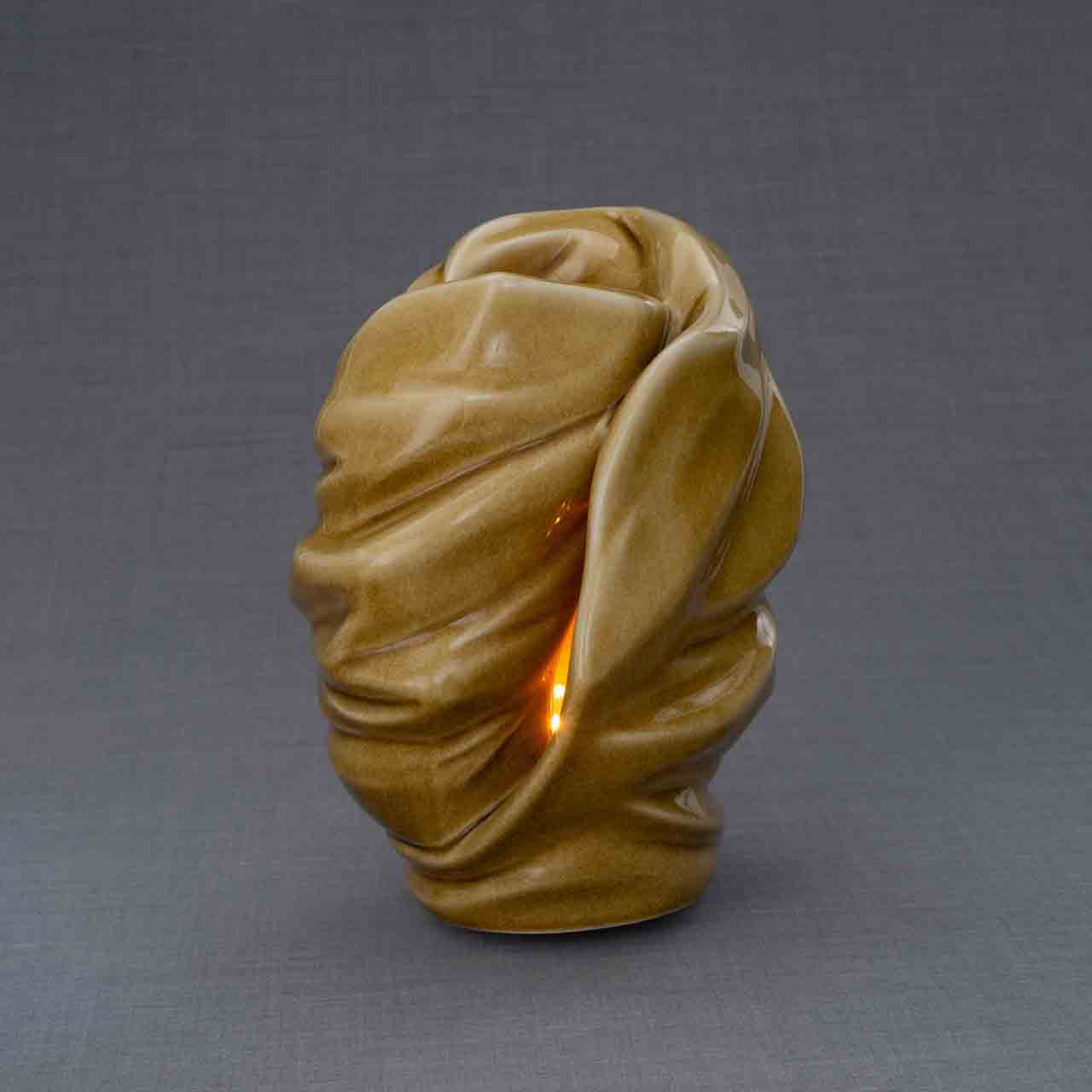 Light Cremation Urn for Ashes in Dark Sand Turned Left Grey Background