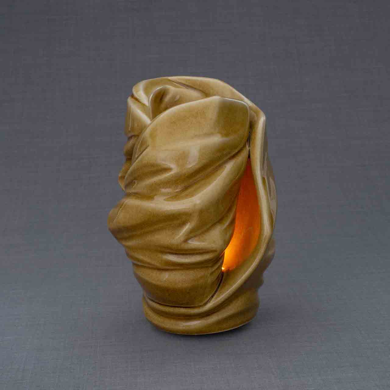 Light Cremation Urn for Ashes in Dark Sand Turned Right Grey Background