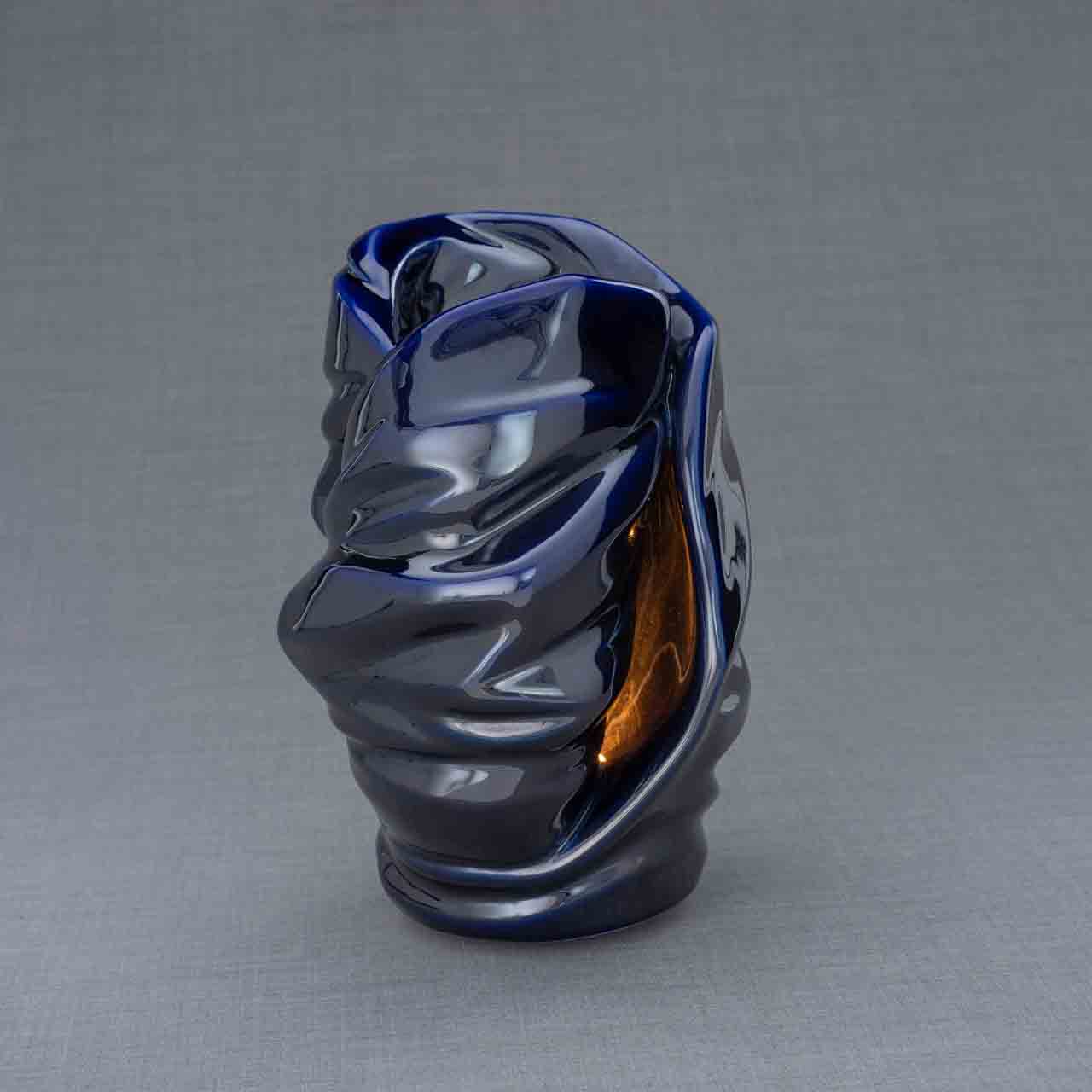Light Cremation Urn for Ashes in Metallic Blue Turned Left Dark Background