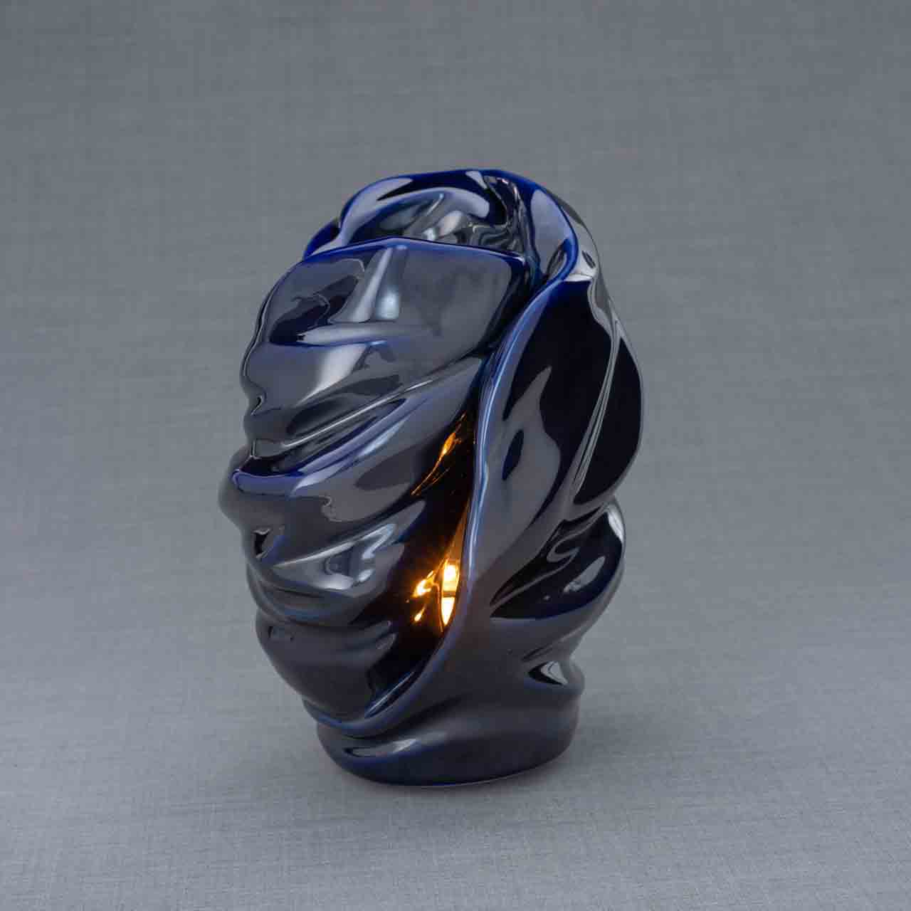 Light Cremation Urn for Ashes in Metallic Blue Turned Right Dark Background