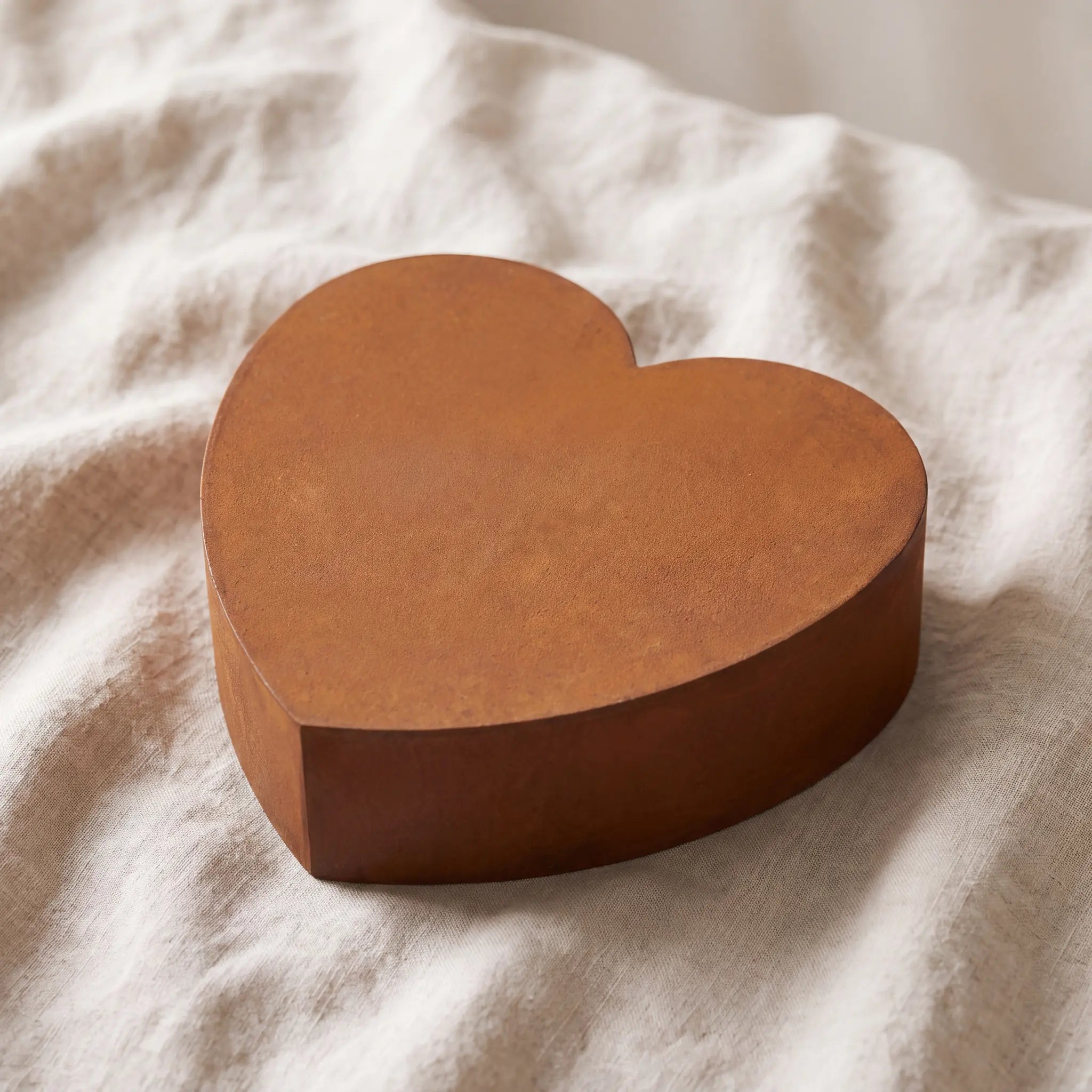 Love-Heart-Companion-Urns-for-Two-Adults-in-Corten-Steel-On-Linen