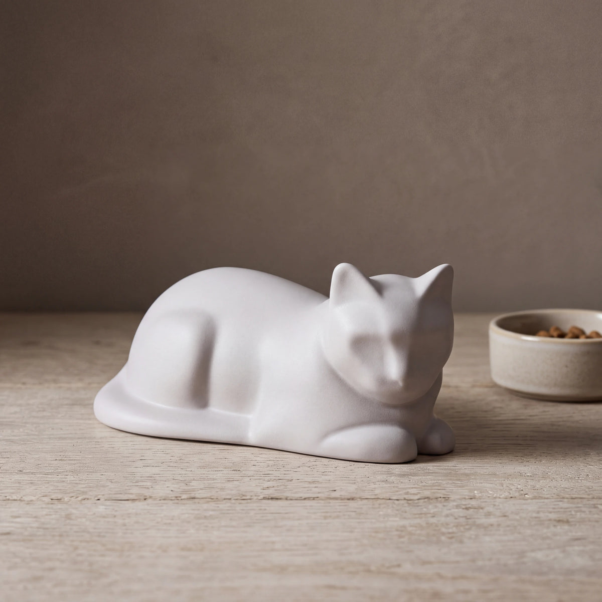 Lying-Cat-Mini-Urn-for-Ashes-in-Matte-White-pet_bowl_ledge