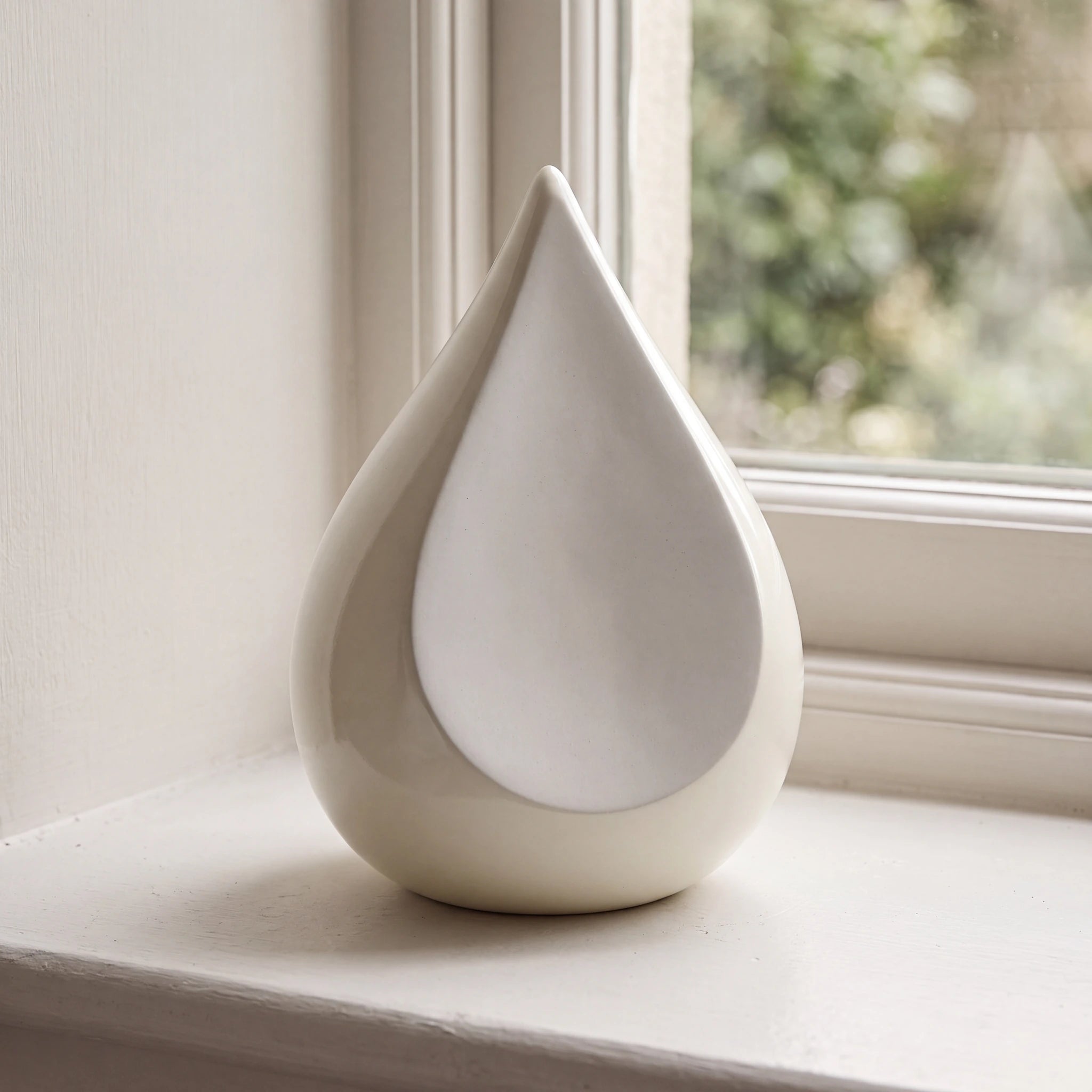 Odyssee Metal Teardrop Urn for Ashes in Ivory and White