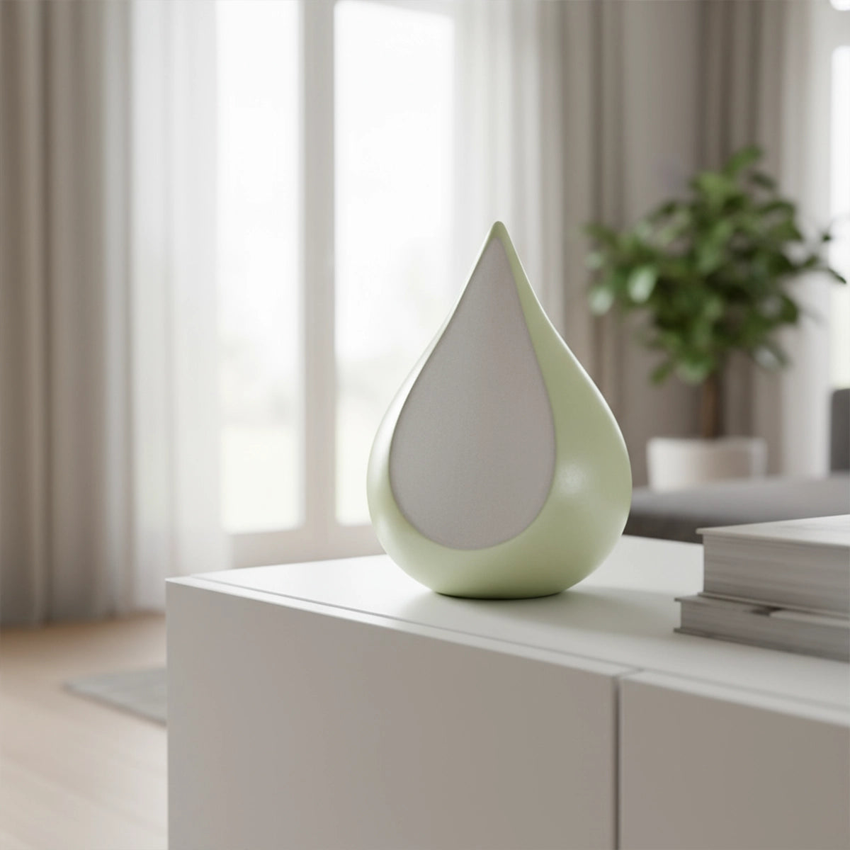 Odyssee Metal Teardrop Urn for Ashes in Ivory and White