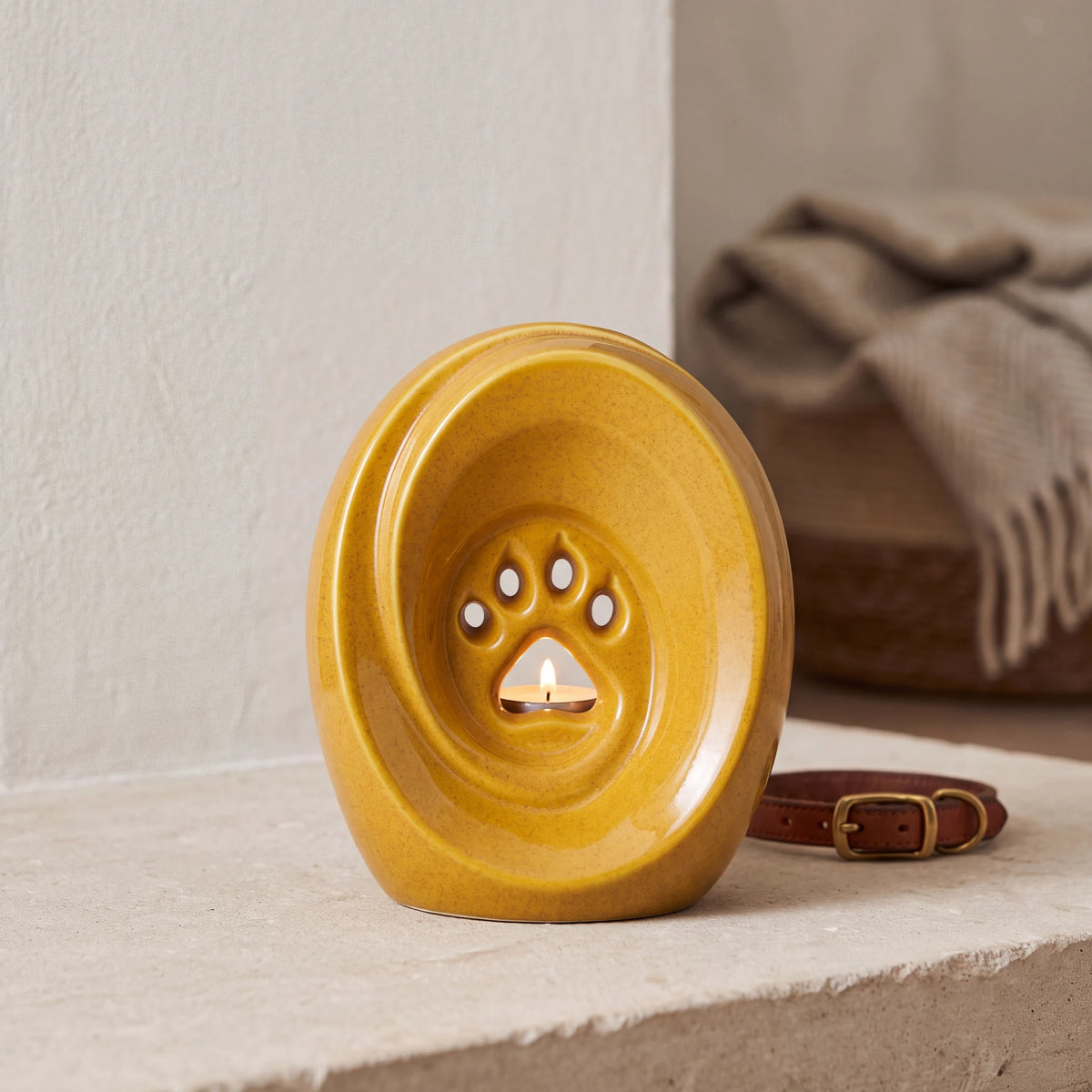 Paw-Pet-Urn-for-Ashes-in-Amber-Yellow-pet_hearth_basket