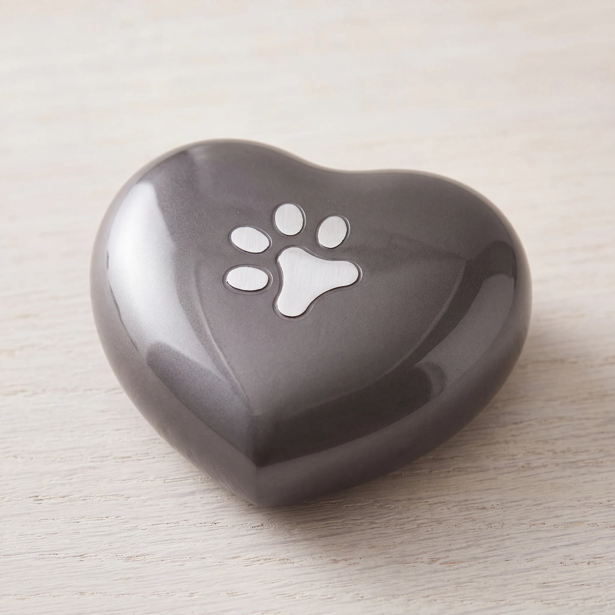 Pawprint-Heart-Pet-Urn-for-Ashes-in-Graphite-Silver-Large-heart_limewash_above