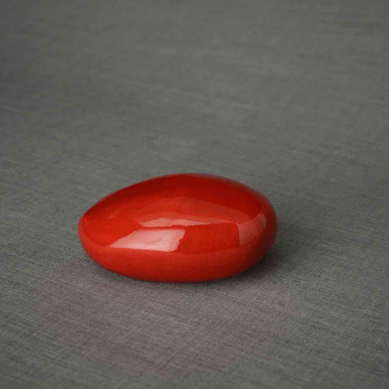 Pebbles Ashes Keepsake Urn in Red Dark Background